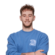 Young man with curly hair and beard smiling in a blue sweater with We&#039;re the Force for Chaos print.