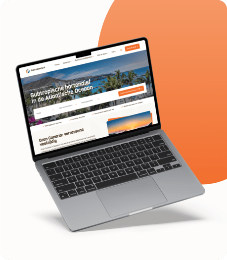 Laptop displaying a travel website for Gran Canaria, featuring accommodations and subtropical scenery in the Atlantic Ocean.
