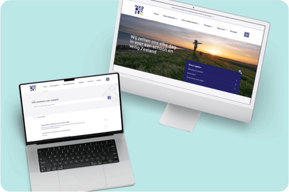 Websites van een Zeelandse organisatie op laptop en desktop tegen een mintgroene achtergrond.