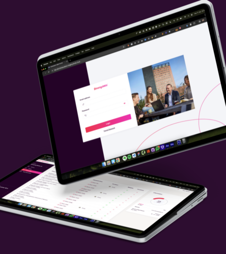 Two laptops with business dashboards and videoconferencing interface against a purple background.