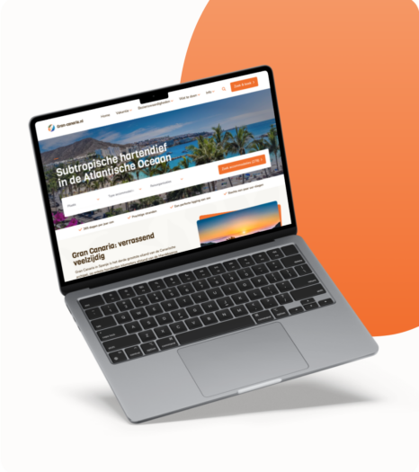 Laptop displaying a travel website for Gran Canaria, featuring accommodations and subtropical scenery in the Atlantic Ocean.